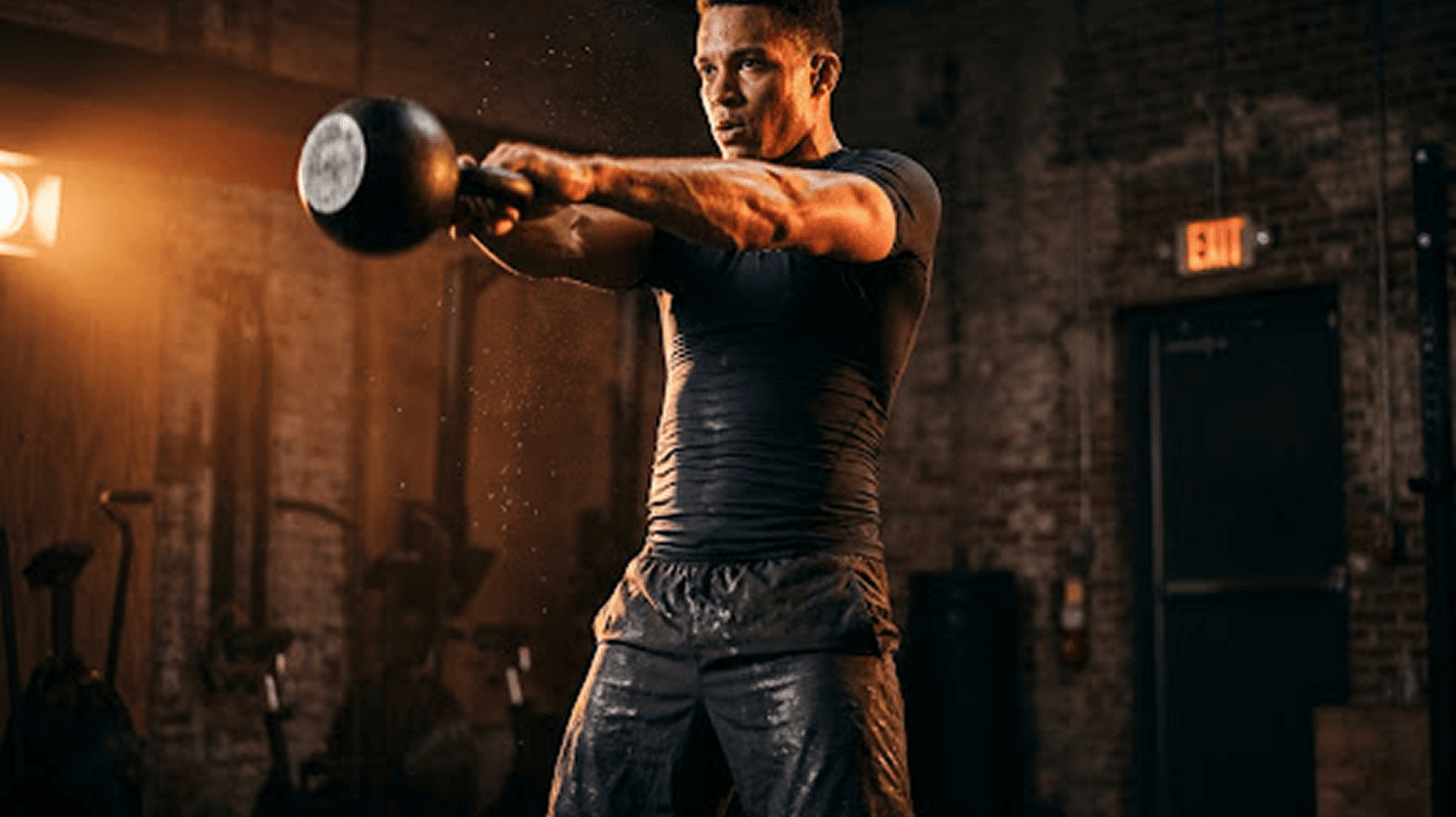 Phoenix Fitness member training with dumbbells